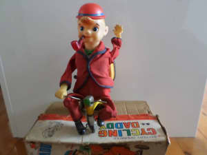 Rare Vintage Cycling Daddy Toy and other Toys