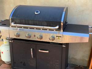 Gas BBQ with side table and 2 x gas bottles