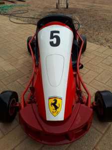 Ferrari, kids petrol go cart. Runs and drives
