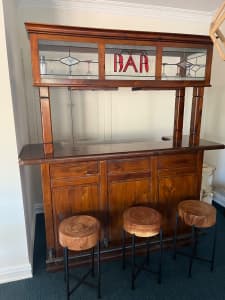 Free standing wooden bar and stools