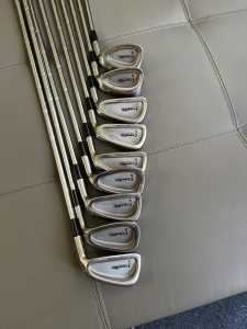 Complete set of golf clubs and buggy