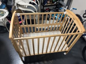 Wanted: Brand new baby cot. Only assembled comes with portable bassinet.