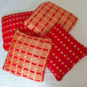 Red patterned cushions 