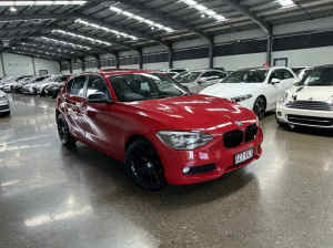 2014 BMW 1 Series F20 MY0713 118d Steptronic Red 8 Speed Sports Automatic Hatchback