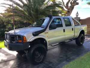 2005 Ford F250 RN XLT (4x4) Silver 4 Speed Automatic Crew Cab Pickup