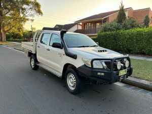 2014 Toyota Hilux KUN26R MY14 SR (4x4) White 5 Speed Manual Dual Cab Chassis Lidcombe Auburn Area Preview
