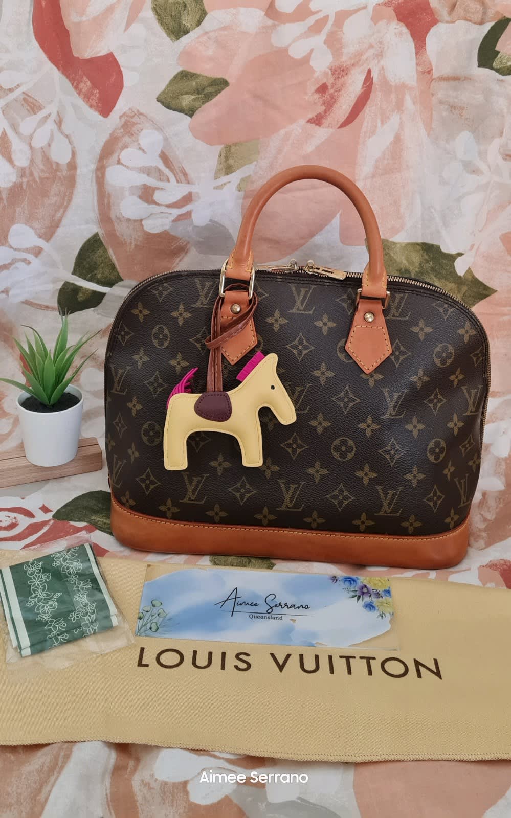 Barley used Louis V bag Alma BB,the paperwork and box in perfect condition