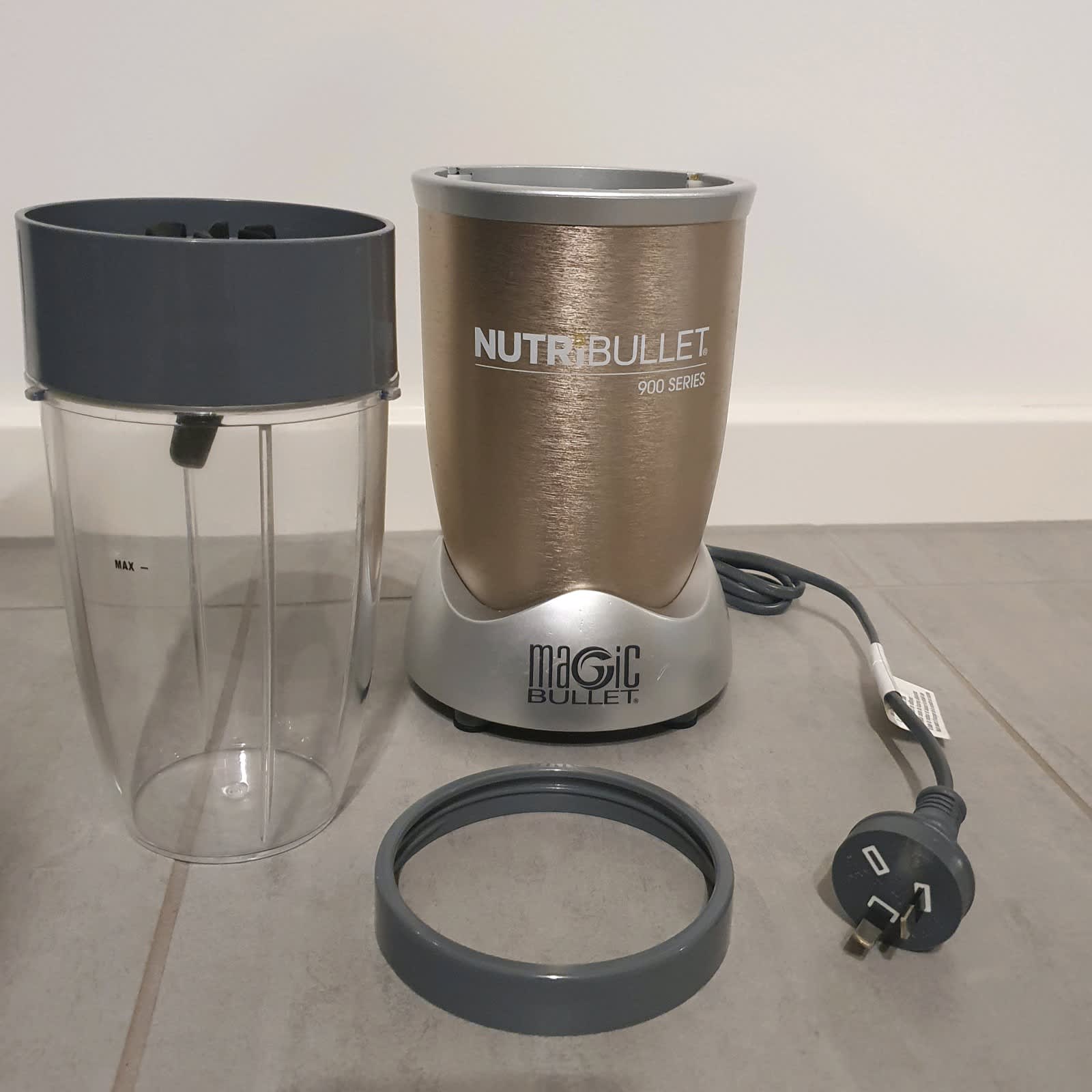 NUTRIBULLET PRO 900 ROSE GOLD ORIGINAL BOX MISSING ONE CUP AND HANDLE