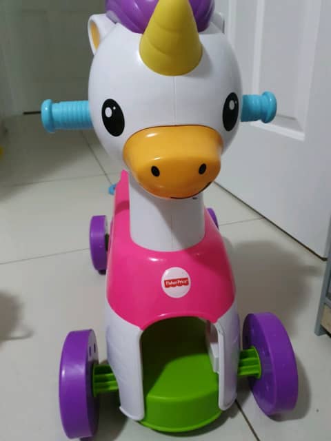 unicorn ride on toy fisher price