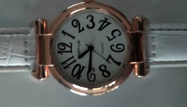 Impulse quartz watch discount ladies