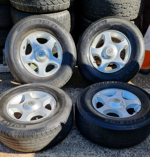 4xTOYOTA LANDCRUISER 100 IFS ALLOY WHEELS 16X8 GENUINE CHEAP SET 4CAPS