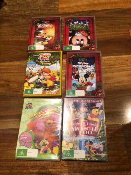 Disney Dvds Including Mickey Mouse And Winnie The Pooh Cds And Dvds