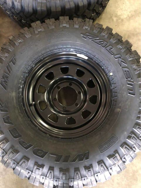 35 mud tyres and D hole style steel sunraysia rims 16x8 Landcruiser ...