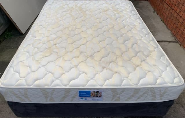 Good condition queen size bed mattress with black bed base for sale ...