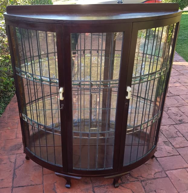 Antique large two door, mirror back, leadlight display