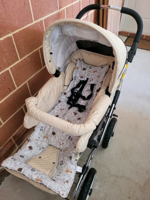 cream leather pram