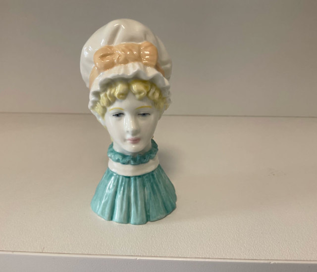 Porcelain candle snuffer by Royal Worcester made 1976 in England