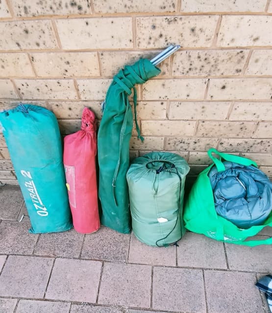 Mixed Camping Gear. Tents, sleeping bags, stretcher Bed Camping