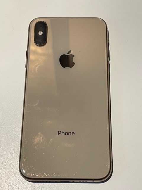 Gold iPhone XS with brand new and unused accessories | iPhone