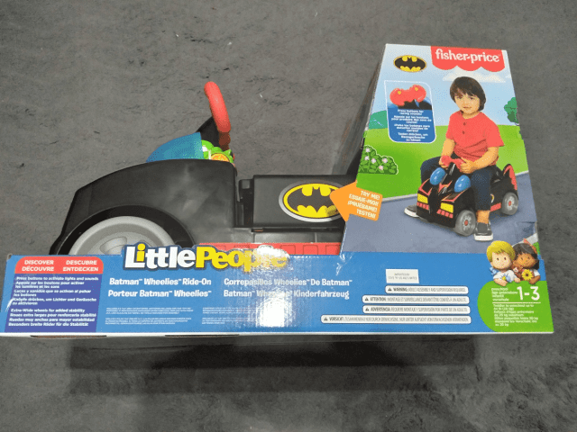 Fisher price batman wheelies ride clearance on