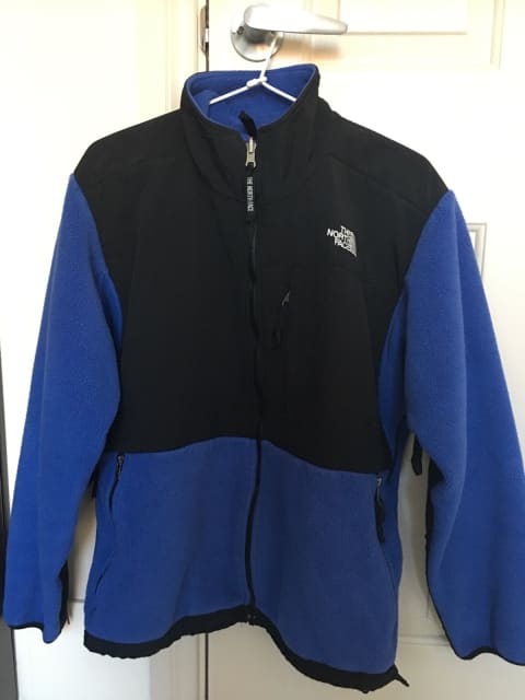 blue and black north face fleece