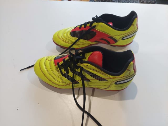 yellow predator boots