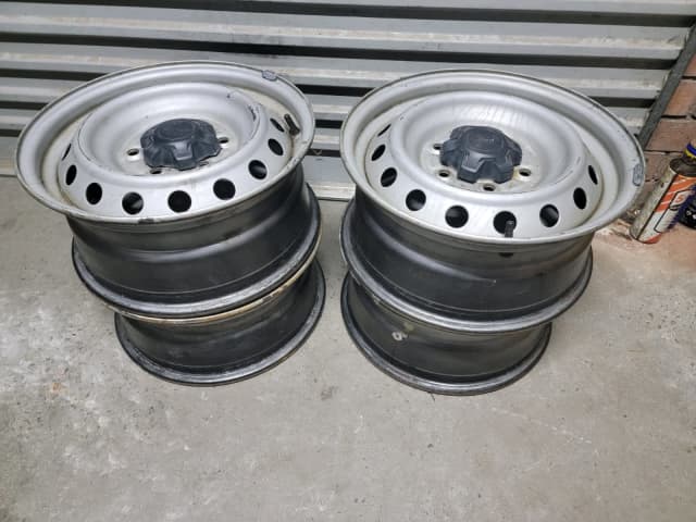 4 x FORD RANGER RIMS, including the Centre Caps Genuine FORD RANGER