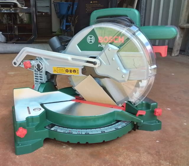 MITRE SAW 10 inch BOSCH PCM 1800 WITH LASER (NEW) Miscellaneous Goods