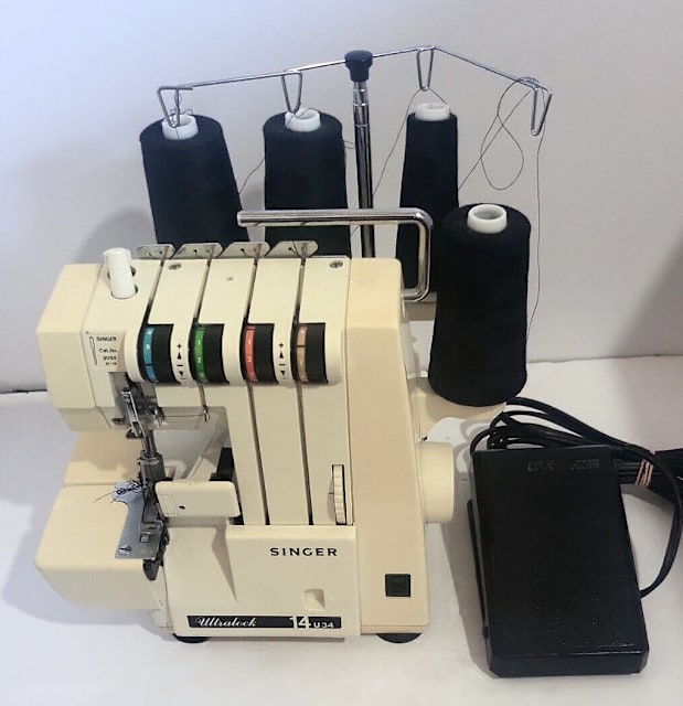 Singer Ultralock 14U34B serger sewingmachine.Original pedal power cord