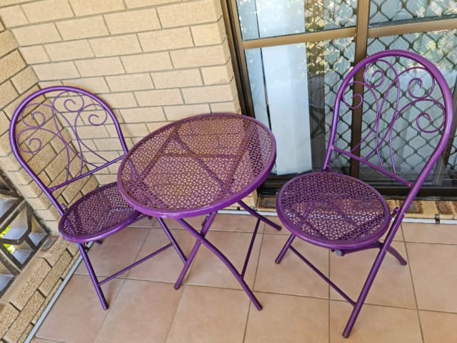 purple table and chairs