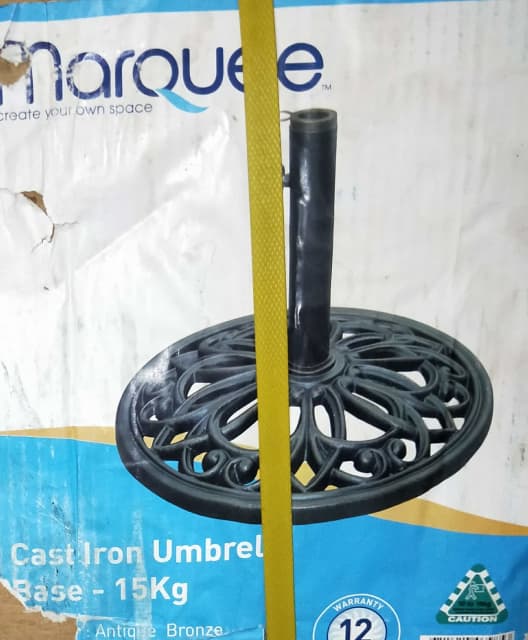 Cast iron umbrella stand 15kg. Still brand new inbox Parasols