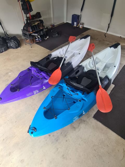 Two kayaks for sale - with paddles, seats, life jacket and roof