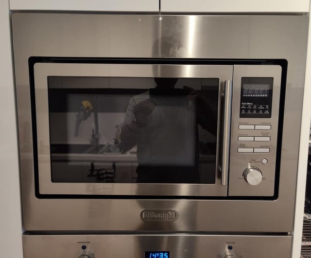 Integrated DeLonghi DE60COMBI Convection Microwave with trim kit