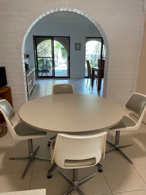 round table with 4 swivel chairs