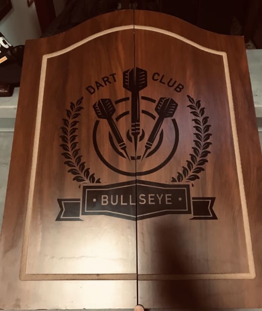 Wall mountable dart board in wooden case. Other Sports & Fitness