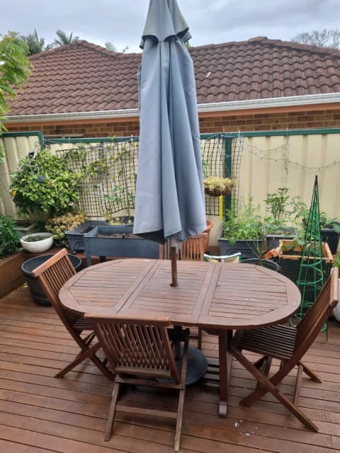 4 piece outdoor dining set with umbrella