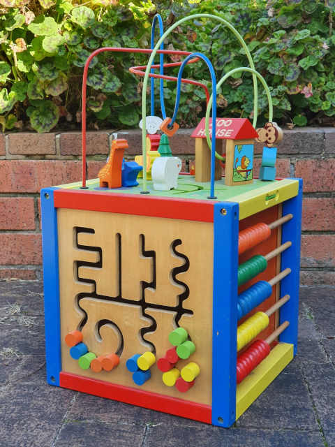 activity cube with xylophone