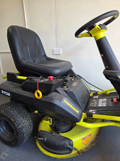 Ryobi RM300e Electric Rear Engine Ride-on Lawn Mower. Great condition ...