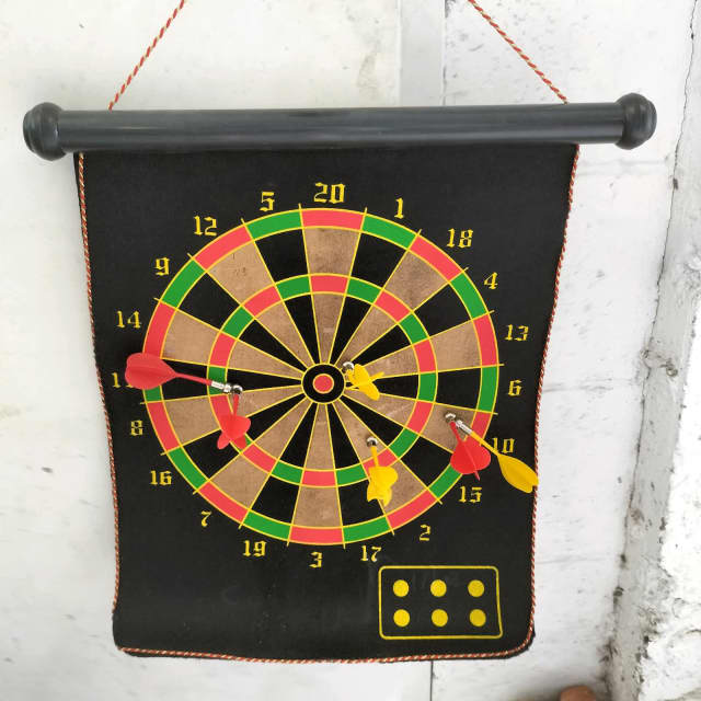 Two sided dart board with storage tube. Toys Indoor