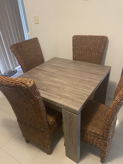 square rattan table and 4 chairs