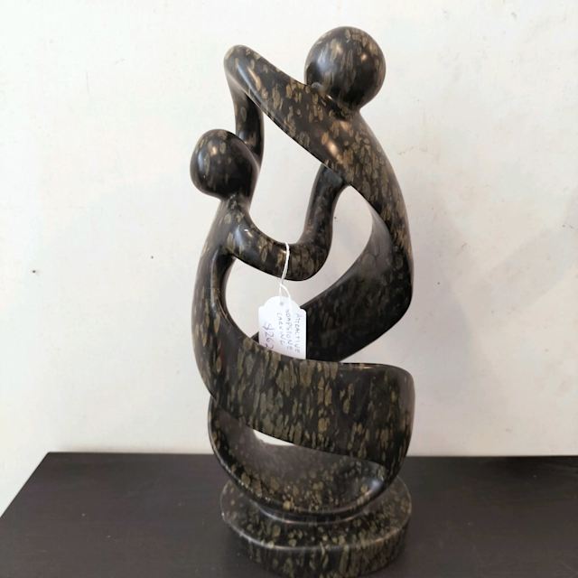 Stunning " entwined" carved soapstone sculpture. Size in pics
