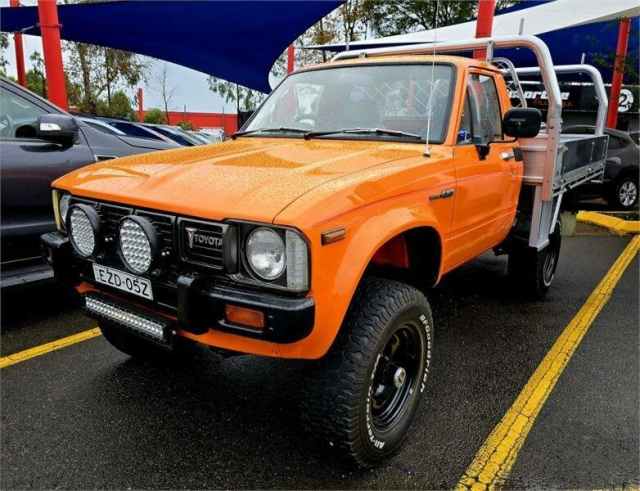 1981 Toyota Hilux Orange Flame 4 Speed Manual Utility | Cars, Vans ...