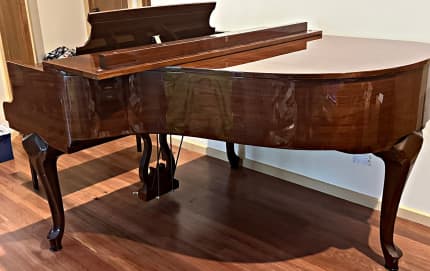 Schimmel piano deals price blue book