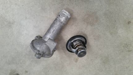 nissan navara d22 thermostat location