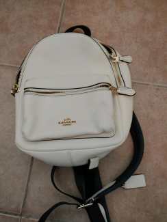 white leather coach backpack