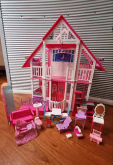 Used barbie doll online house