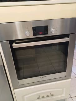 ge double oven door locked