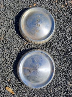 Antique on sale ford hubcaps