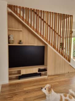 built in tv cabinet under stairs