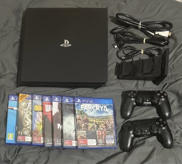 SALE] Sony PS4 Pro 1TB + 2x controllers and charger + 4 games